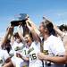 The Michigan softball team celebrates with the Big Ten trophy after the game against Northwestern on Sunday, May 5. Daniel Brenner I AnnArbor.com
